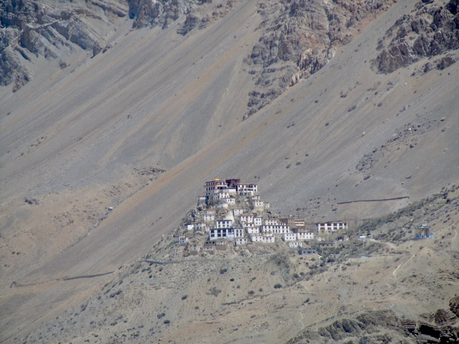 Key Monastery rising in white tiers on a bare hillside in the Spiti valley